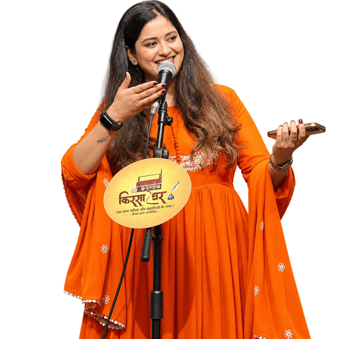 A performer at Qissa Ghar, mid-performance, mic in hand